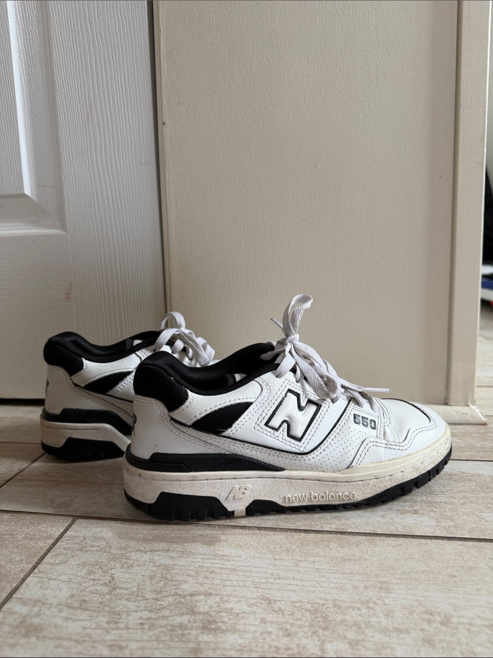 New Balance White and Black Low-Top Sneakers